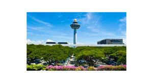 Airport control tower, together with the new inter-terminals transit Skytrain and transit hotel