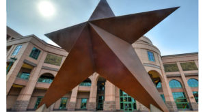 Texas star in front of the Bullock Texas State History Museum in downtown Austin