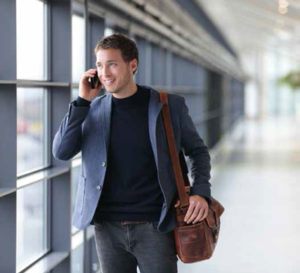 Business traveler arriving at the airport