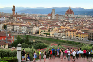 Tourists at Piazzale Michelangelo take in the panorama of the city.