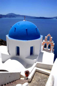 Blue-domed church in the island's village of Oia