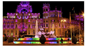 Madrid City Hall with rainbow-lighted fountain