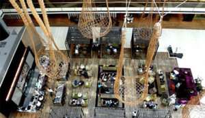 Hilton Buenos Aires' new lobby with wicker artwork resembling fishing nets © JOANNA TRICORACHE