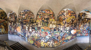 The stairs of the Palacio Nacional with the famous mural The History of Mexico by Diego Rivera