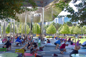 The five-acre Klyde Warren Park offers visitors a variety of activities, from a stroll through the lawns to yoga in the grass to a meal from a food truck.