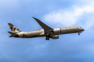 Etihad flying over Melbourne Airport © Sean Cooper | Dreamstime.com