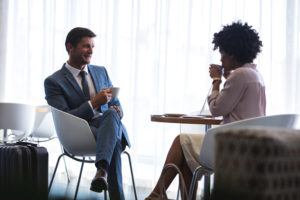 Business travelers in airport lounge