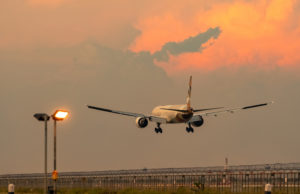 Passenger plane landing at airport. Photo Credit: Artinun Prekmoung | Dreamstime.com