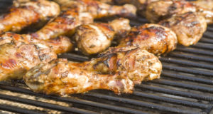 Jerk chicken sold by Jamaican street vendors