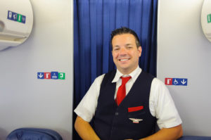 Delta Air Lines Flight Attendant Uniform © Tea | Dreamstime.com