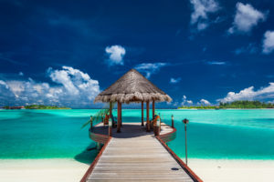 Traditional boat jetty in a luxury resort of Maldives, Indian Ocean