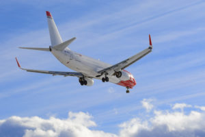 Norwegian Airlines airplane landing to airport