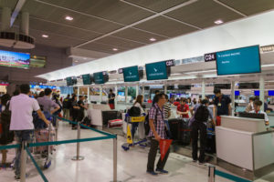 Cathay Pacific Customer Checkin © Uskarp | Dreamstime.com