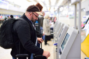 Customer checking-in for flight © Tea | Dreamstime.com