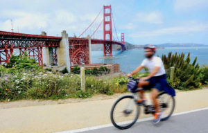 Cyclist in front of the Golden Gate Bridge